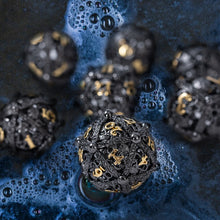 Load image into Gallery viewer, Unique 7-Piece Round Hollow Orb Metal Dice Set - Cthulhu Design (Black Gold)