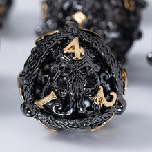 Load image into Gallery viewer, Unique 7-Piece Round Hollow Orb Metal Dice Set - Cthulhu Design Gold