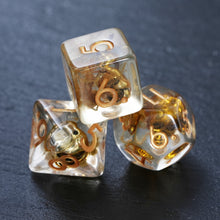 Load image into Gallery viewer, Gold Skull Resin Dice Set - Unique Golden Skull Dice for DND and Role Playing Games (RPG)