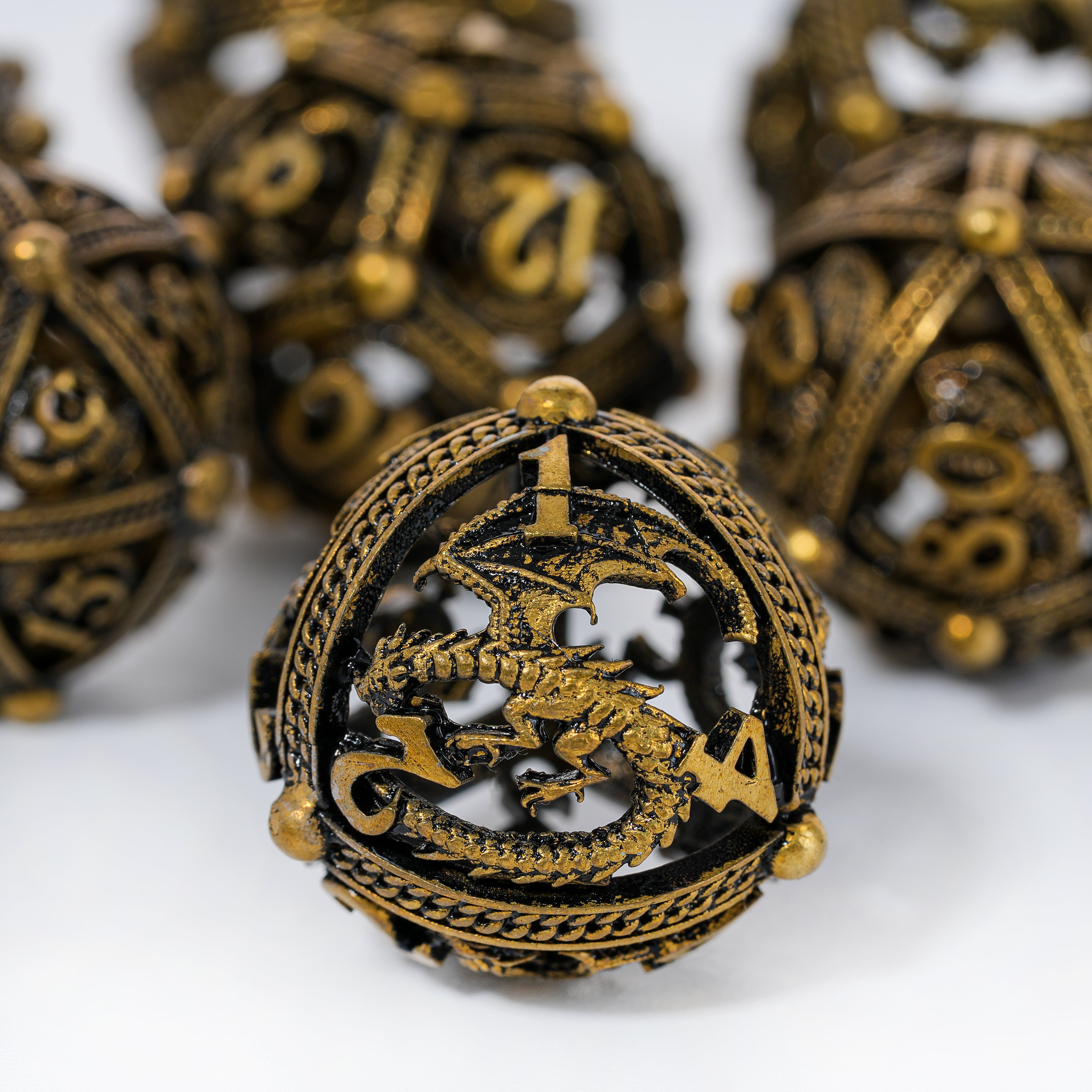 Unique 7-Piece Round Hollow Orb Metal Dice Set - Dragon Design Dragon (Ancient Bronze)