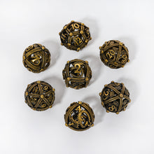 Load image into Gallery viewer, Unique 7-Piece Round Hollow Orb Metal Dice Set - Dragon Design