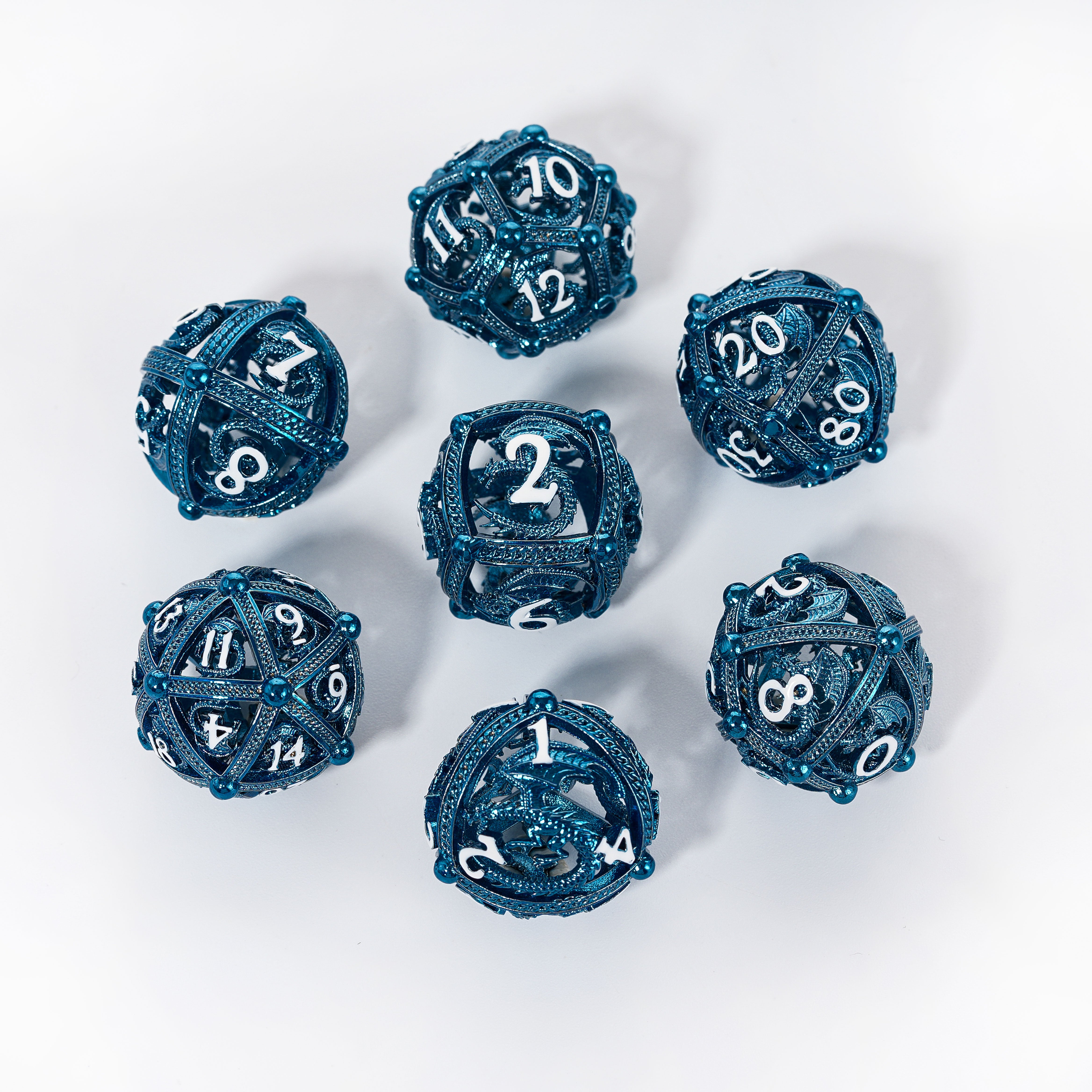 Unique 7-Piece Round Hollow Orb Metal Dice Set - Dragon Design