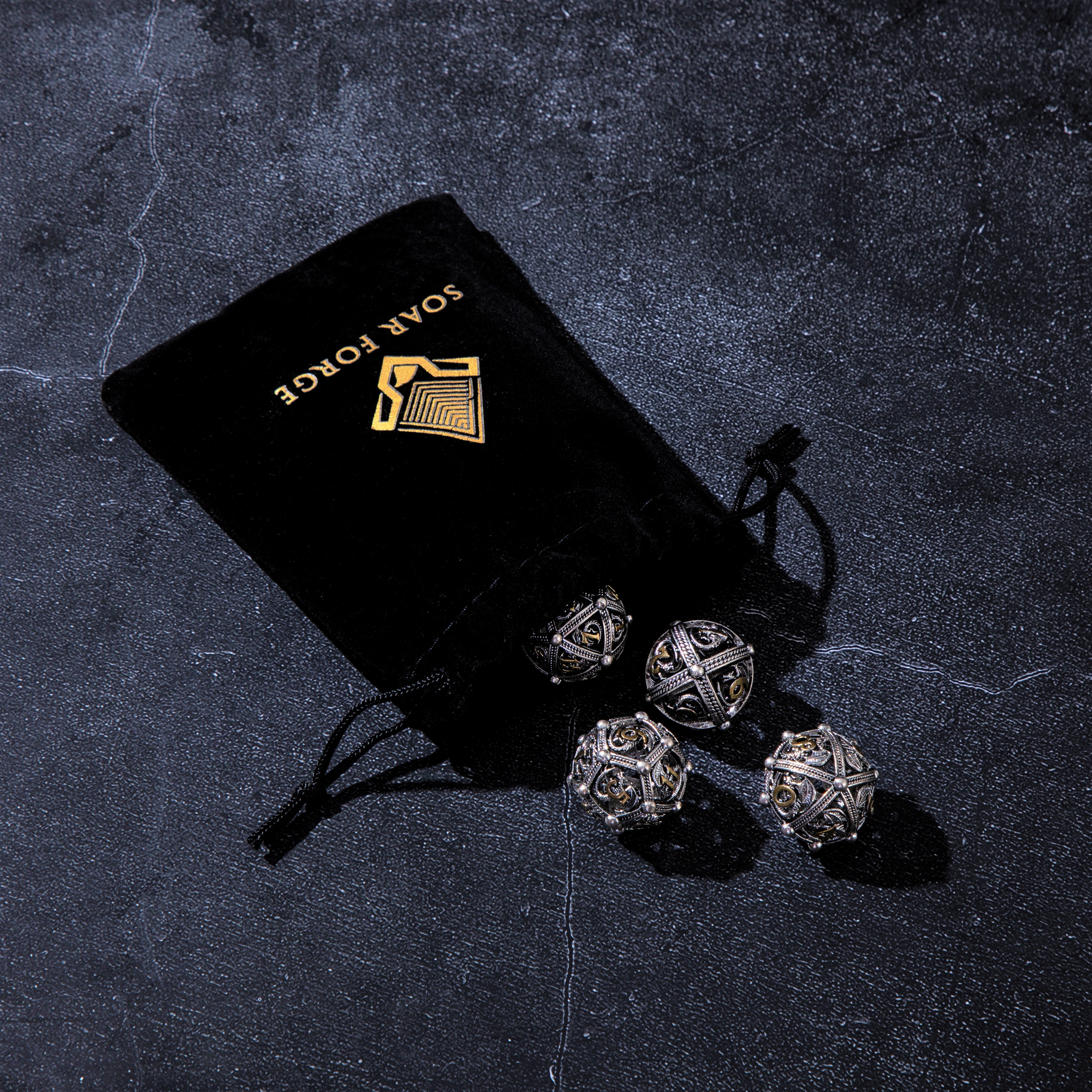 Unique 7-Piece Round Hollow Orb Metal Dice Set - Dragon Design