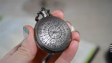 Load and play video in Gallery viewer, Micro Metal Dice Set for DND - MiniChrono’s Tiny Dice in Magic Circle Pocketwatch Case