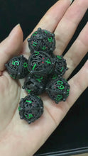 Load and play video in Gallery viewer, Unique 7-Piece Round Hollow Orb Metal Dice Set - Cthulhu Design