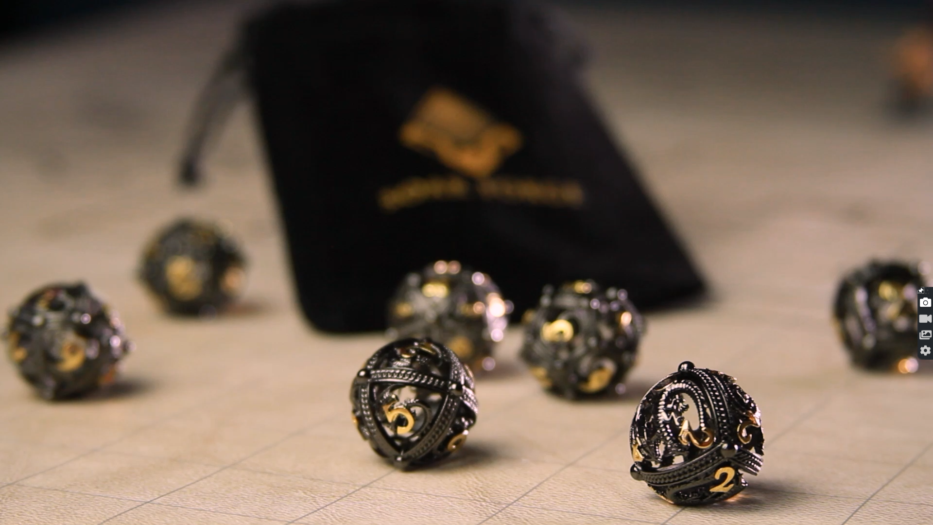 Unique 7-Piece Round Hollow Orb Metal Dice Set - Dragon Design
