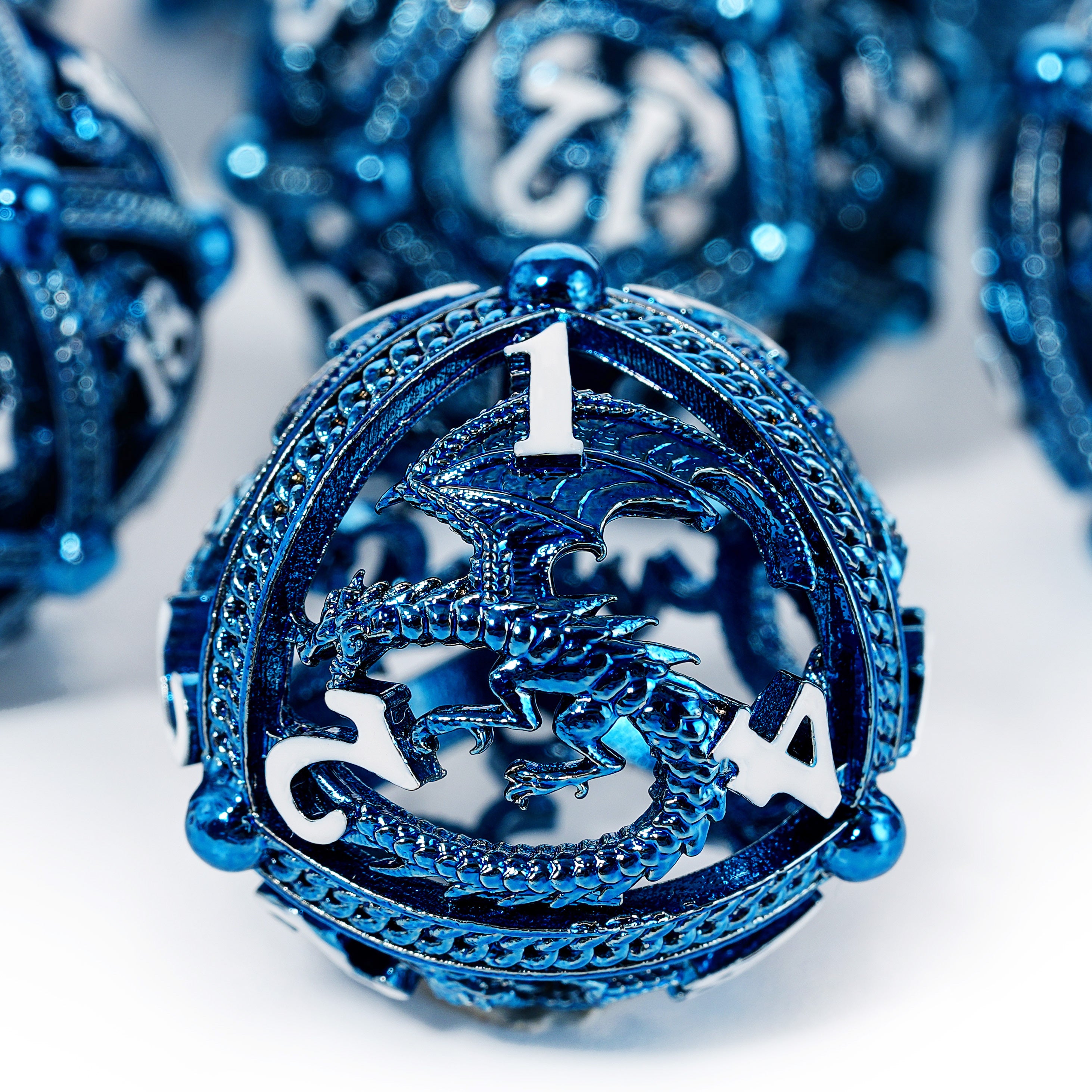 Unique 7-Piece Round Hollow Orb Metal Dice Set - Dragon Design Dragon (Blue)