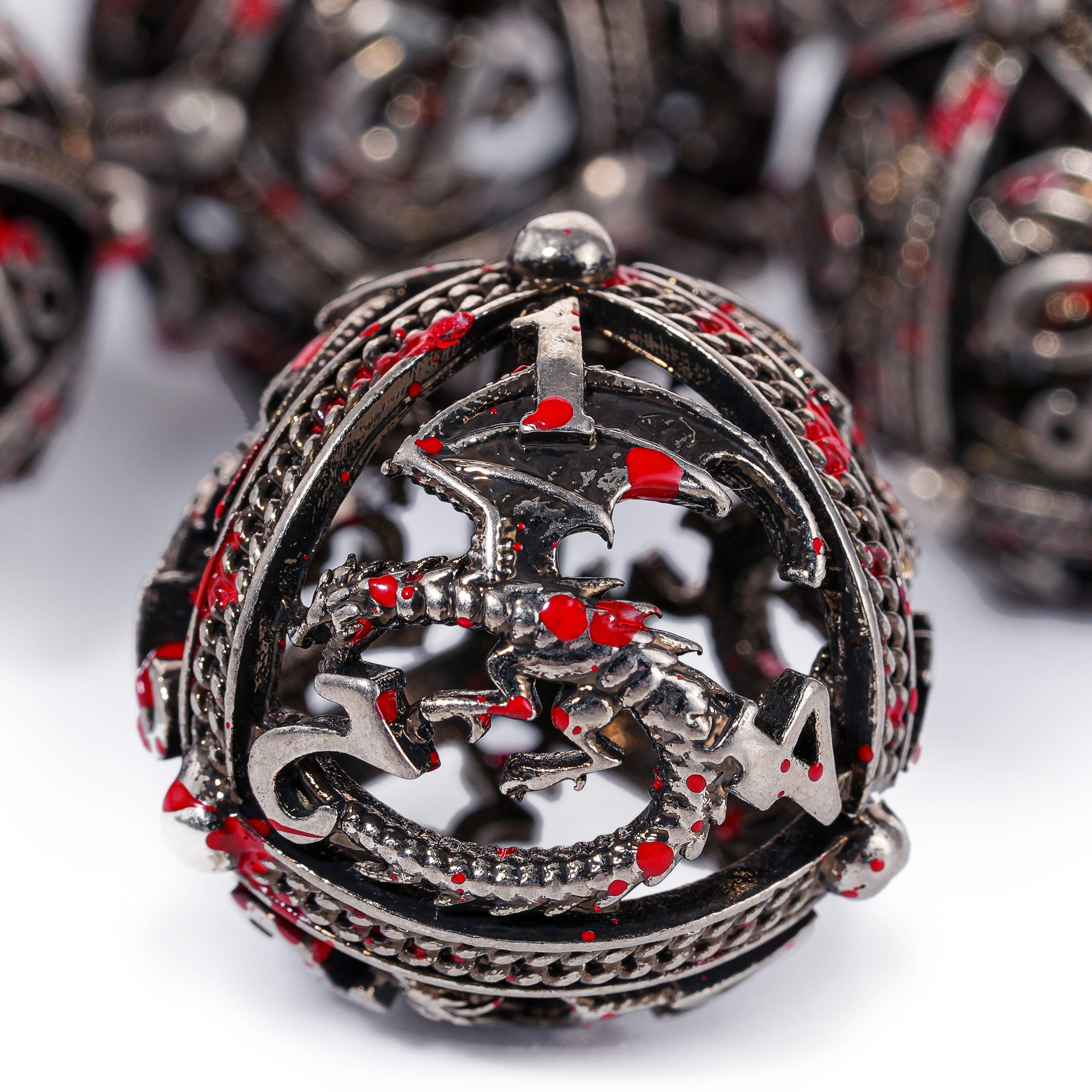 Unique 7-Piece Round Hollow Orb Metal Dice Set - Dragon Design Dragon (Iron Blood)