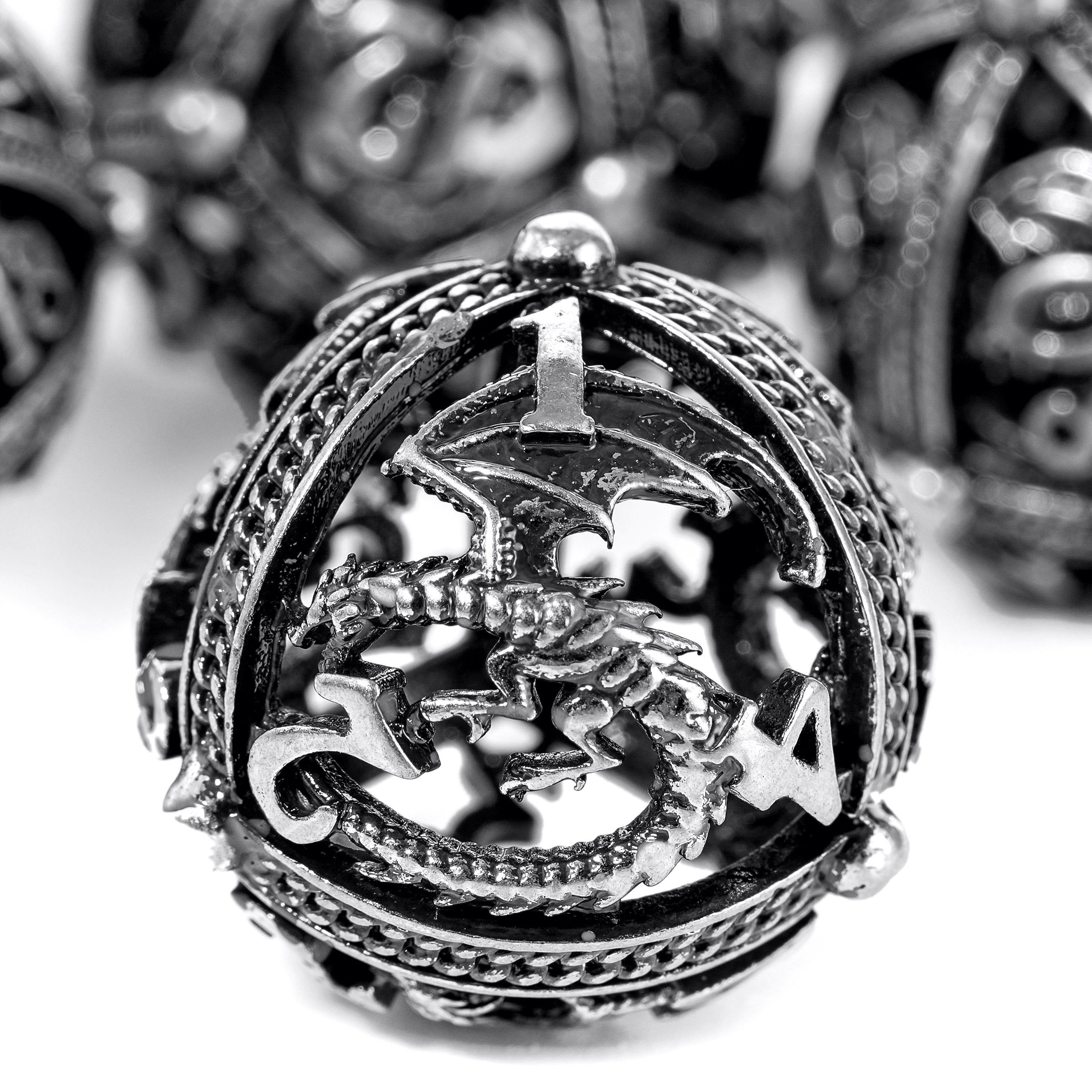Unique 7-Piece Round Hollow Orb Metal Dice Set - Dragon Design Dragon (Ancient Iron)