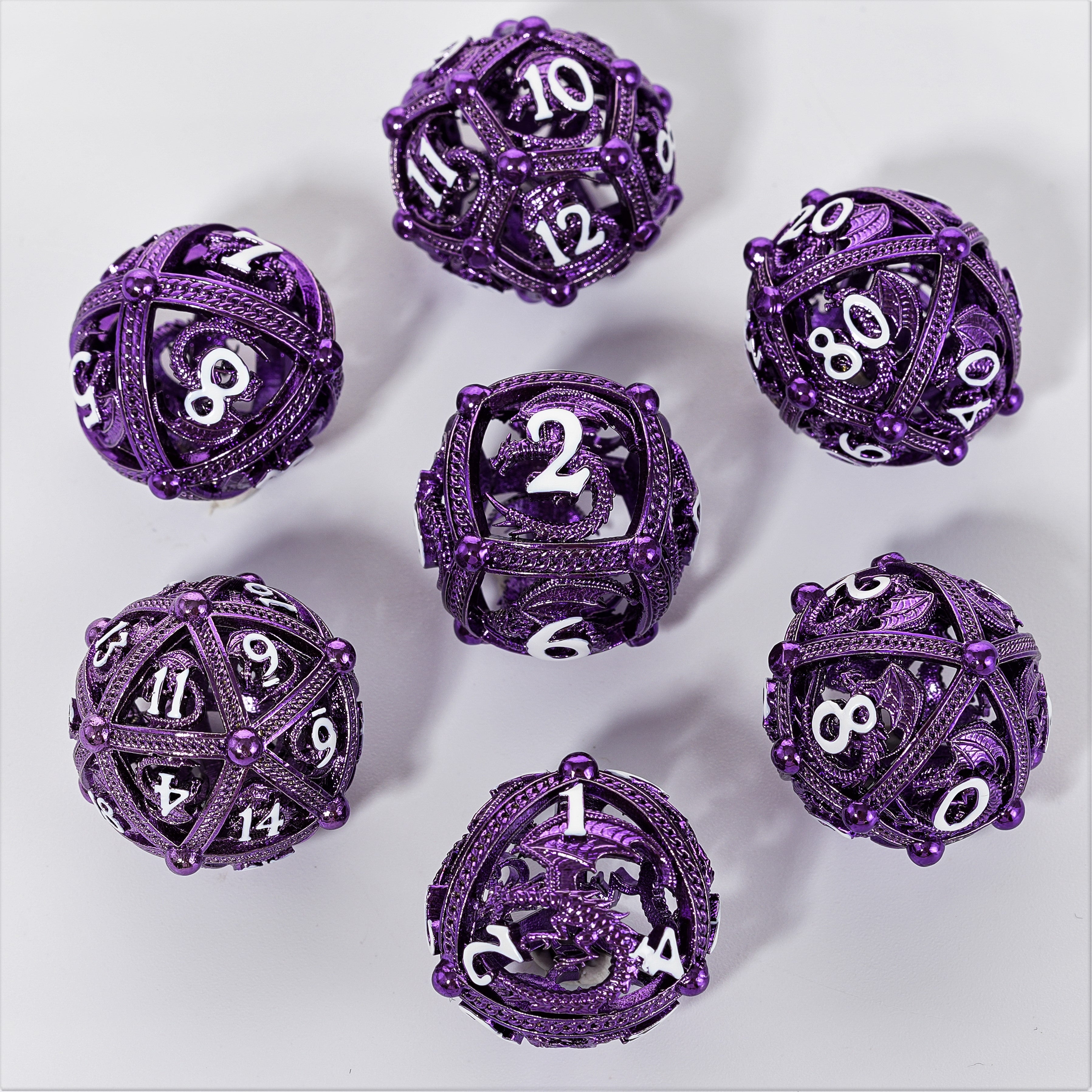 Unique 7-Piece Round Hollow Orb Metal Dice Set - Dragon Design