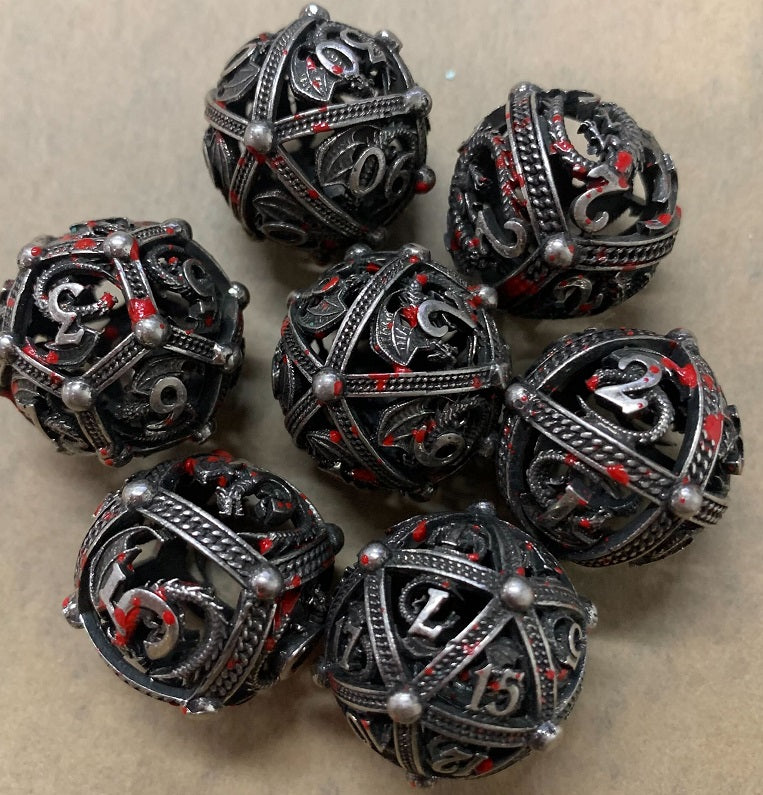Unique 7-Piece Round Hollow Orb Metal Dice Set - Dragon Design