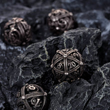 Load image into Gallery viewer, Unique 7-Piece Round Hollow Orb Metal Dice Set - Dragon Design
